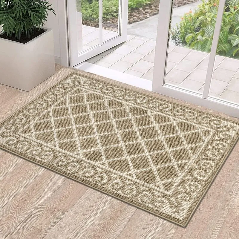 Beige geometric mat placed inside a glazed doorway